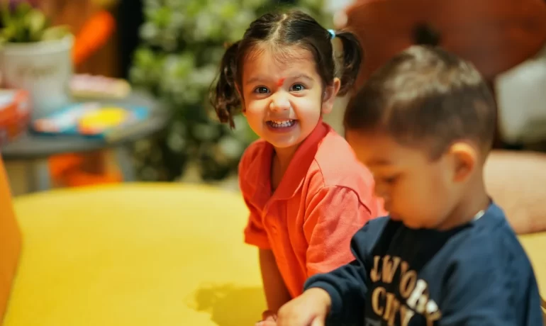 Happy children learning and playing at the best play school in Dehradun with a safe early learning environment